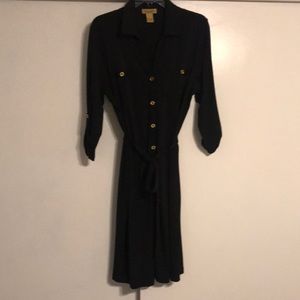 Black button up dress, with quarter length sleeves and stretchy fabric